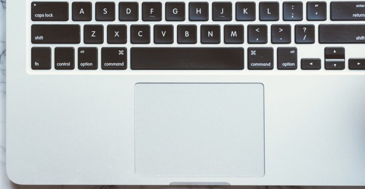 Macbook-Keyboard-on-Marble-Closeup-745×386