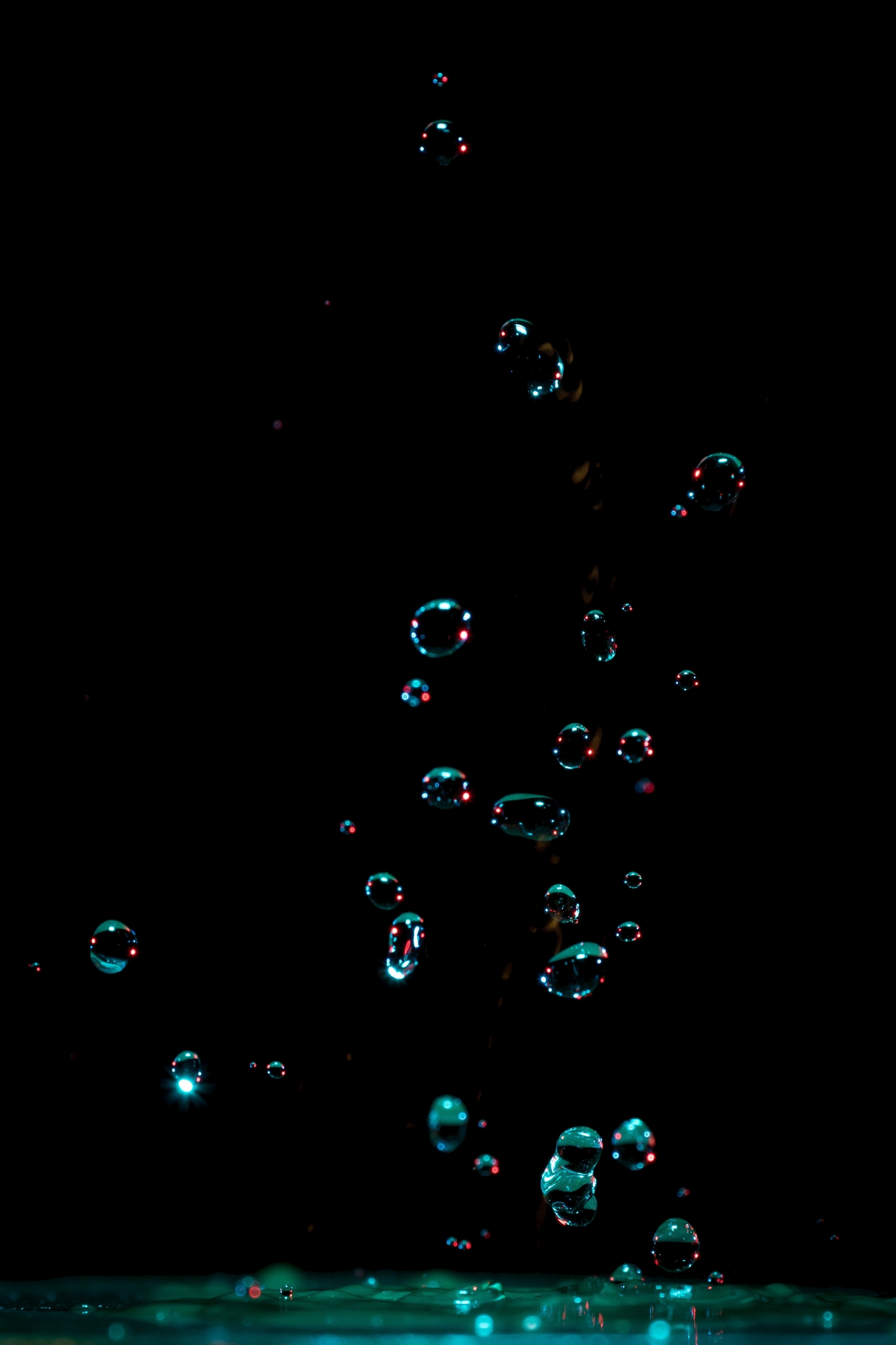 OLED-iPhone-11-Pro-green-wallpaper-iDownloadBlog-bubbles