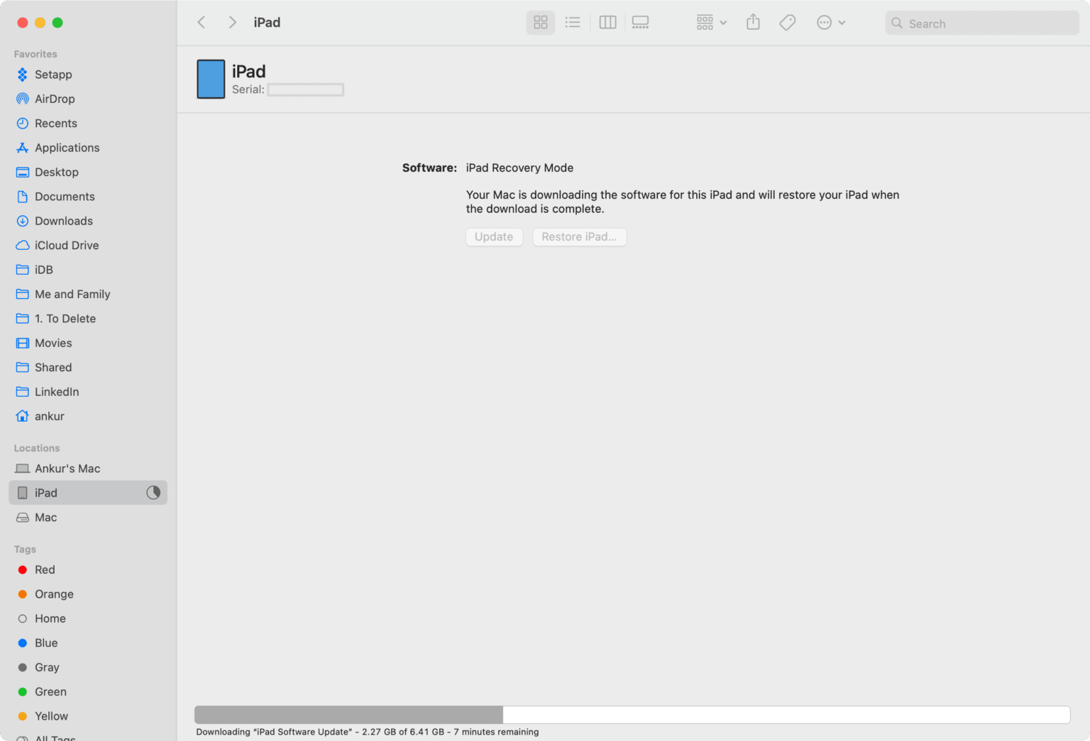 iPad-being-restored-using-Mac-1536×1044